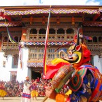 religion buddh. Dance, with Garuda head in front of Gangteng Gompa